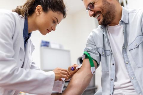 Doctor finished drawing patients blood